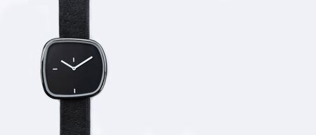 close up of black wrist watches isolated on white background