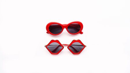 Modern fashionable sunglasses isolated on white backgroundの写真素材