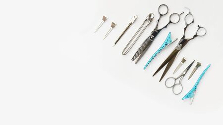 Set of professional hairdresser tools isolated on white backgroundの写真素材