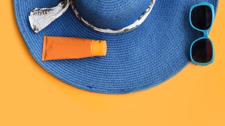 Summer concept. Relax on the beach, sunblock and sunglassesの写真素材