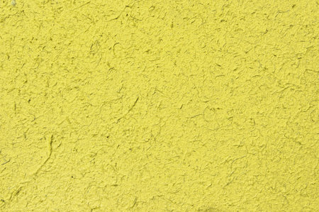 close up of yellow paper texture for backgroundの写真素材