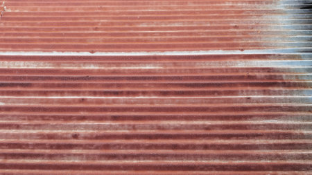 Old zinc surface background or the tin roof background with the rustの写真素材