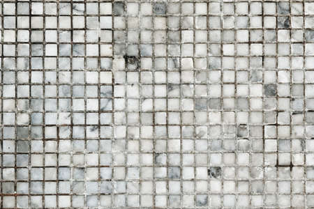 close up of gray tiled floor for backgroundの写真素材