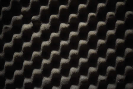 Soundproof wall in sound studio, background of sound absorbing sponge