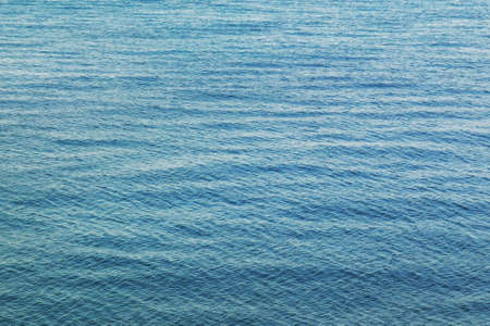 close up of blue sea water surface natural backgroundの写真素材