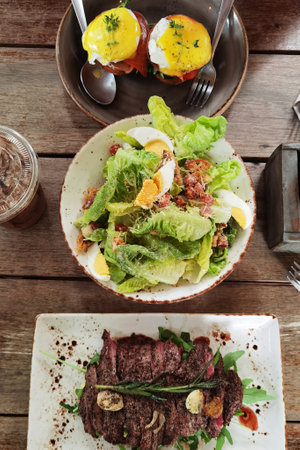 Grilled beef steak with fresh vegetable salad on the plat. healthy food.の写真素材