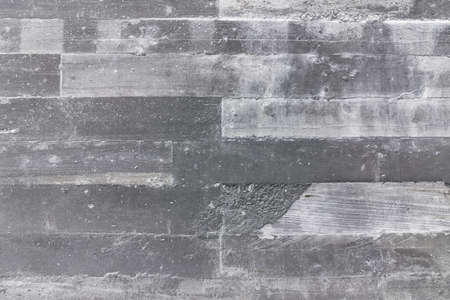 Concrete cement cracked wall texture for background take with selective color technique and art lightingの写真素材
