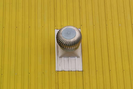 Roof ventilator for heat control moving on the roof.の写真素材