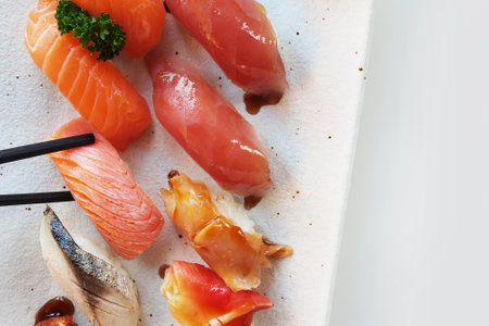 Closeup of fresh sushi on ceramic dish, Japanese foodの写真素材