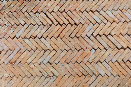 Old brown brick street floor texture backgroundの写真素材