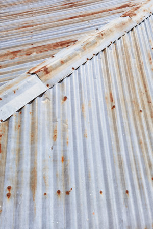 rusty old zinc roof sheet for backgroundの写真素材