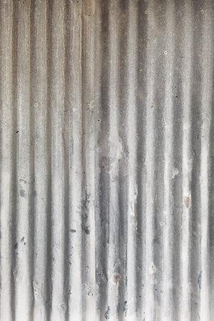 Old zinc surface background or the tin roof background with the rustの写真素材