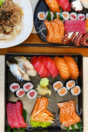 Closeup of fresh sushi on ceramic dish, Japanese foodの写真素材