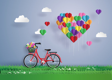 Red bikes parked on the grass with heart shaped balloons  floating on the sky. Design and produce by vector of paper art and craft style.のイラスト素材