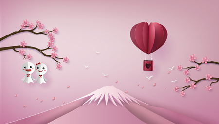 illustration of love and valentine day,Origami made hot air balloon flying on the sky with heart float on the sky and mountain.paper art style.のイラスト素材