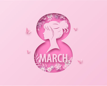 A pink paper cut design featuring a woman's silhouette inside the number 8, symbolizing International Women's Day on March 8の写真素材