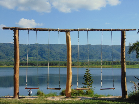 Swing in the midst of the blue sky is the background.の写真素材