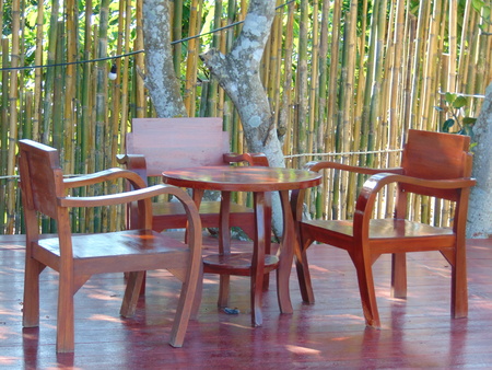 Wooden bench rests on the courtyard.の写真素材