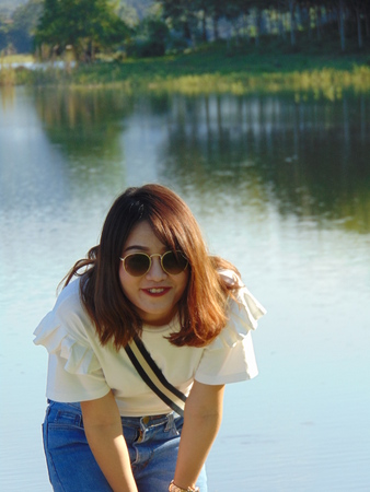 Beautiful woman standing in the beautiful natureの写真素材