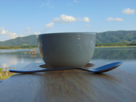 Drink coffee in the beautiful nature.の写真素材