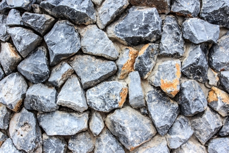 crushed stone wall backgroundの写真素材