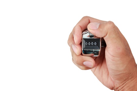 hand holding a counter with zero number in the display isolated on white の写真素材