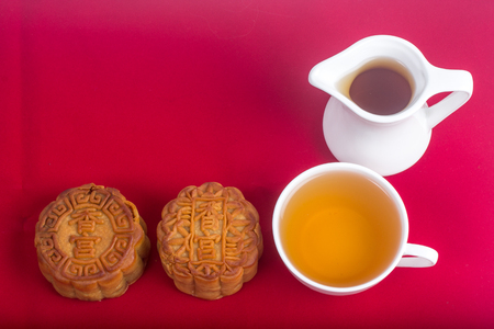chinese mooncake on red velvetの写真素材