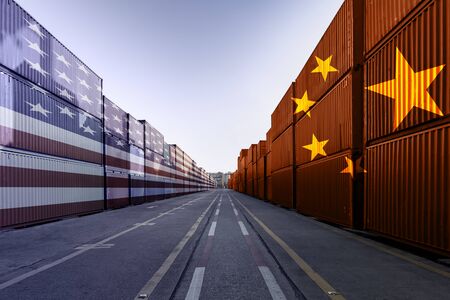 Metaphor image of United States of America and China trade war tariffs as two opposing container cargo in the port as an economic taxation dispute over import and exports conceptの写真素材
