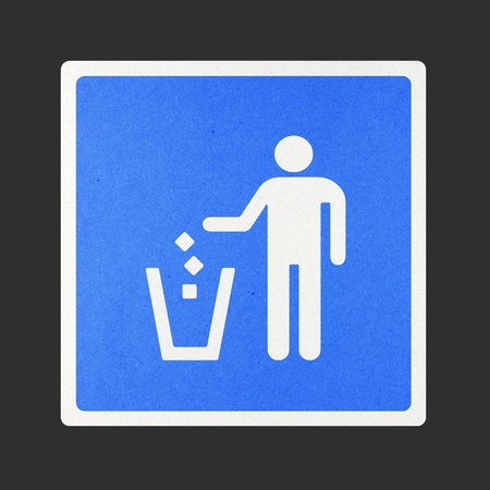A garbage dump traffic sign recycled paper on white background.の写真素材