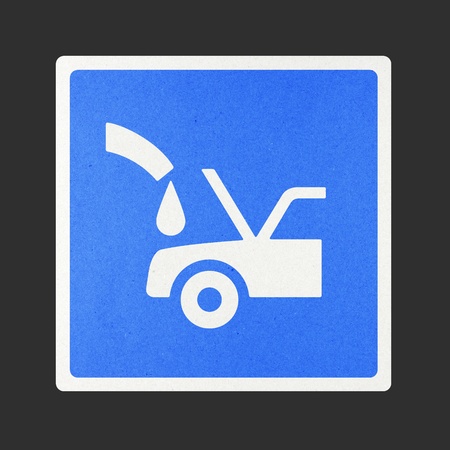 Fill car radiator traffic sign recycled paper on white background.の写真素材