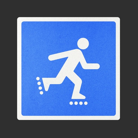 Skating traffic sign recycled paper on white background.の写真素材