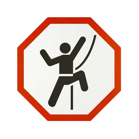 Climb the rope traffic sign recycled paper on white background.の写真素材