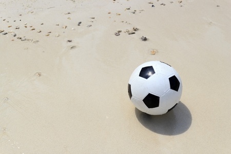 Soccer ball on beach.の写真素材