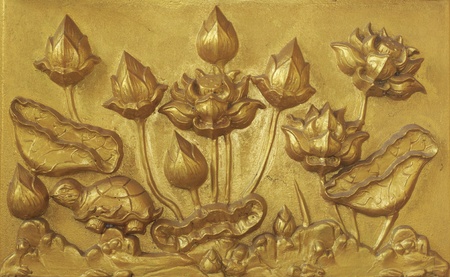 Carving on the wall at Wat Paknam Joelo in Chachoengsao province at thailand.の写真素材