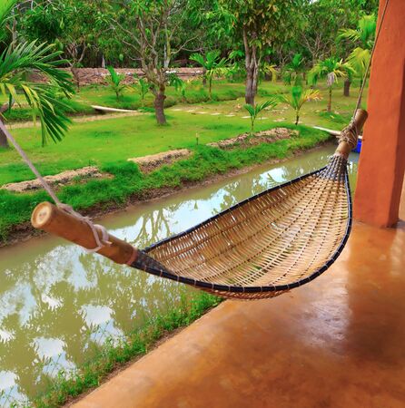 View of nice hammock hanging between two pillar.の写真素材