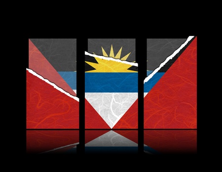 Antigua and Barbuda flag of tear paper with gift cards  Mulberry paper on black background の写真素材