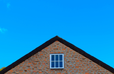 The roof of the house under the sky 