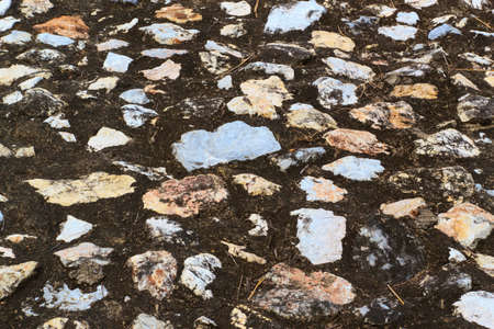 Walls built from natural stone with paint multi color 