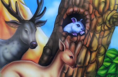 Painting in thailand temple that there are a lot story of animal on the wall, Deer and mouse のeditorial素材