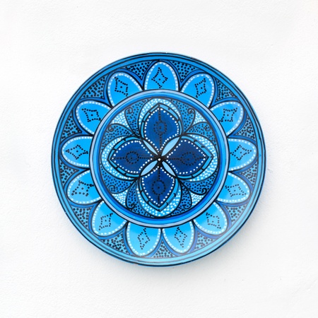 Colorful ceramics or porcelain on the wall の写真素材