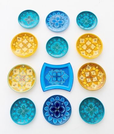 Colorful ceramics or porcelain on the wall 