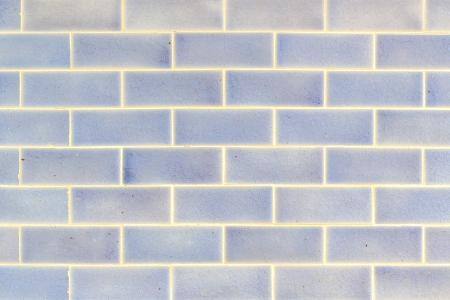 Texture background of blue and white tile wall. 