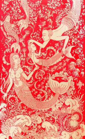 The beautiful Thai pattern on a wall of temple in the mermaid pattern.のeditorial素材
