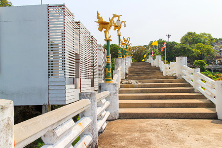 Old concrete stairs is the overpass in the sea view.の写真素材