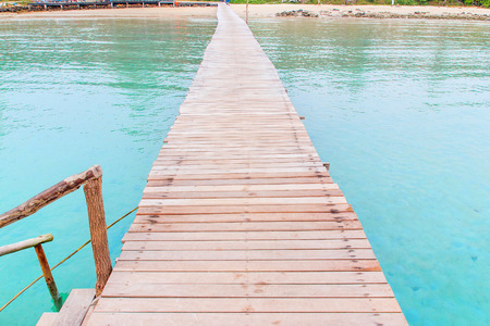 Wooden jetty over sea travel in the holidays.の写真素材