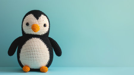 Vibrant handmade crochet penguin, perfect for kids and decor, Ai Generatedの素材