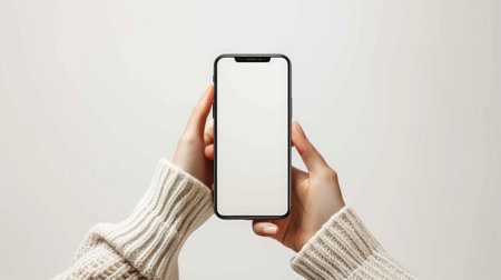 Showcase your digital content with a mobile phone mockup featuring a blank white screen in a human hand. Ai Generatedの素材