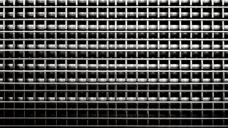 An eyecatching metallic grid plate with a rich texture of rivets, perfect for adding an industrial edge to your designs.の素材