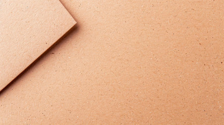 Use this vintage cardboard texture as a stylish background, offering ample space for your content and designs.の素材