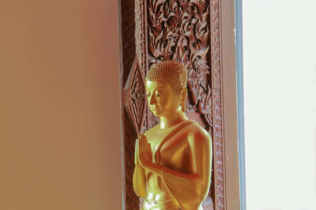 Statue with hands clasped selected focus.の写真素材